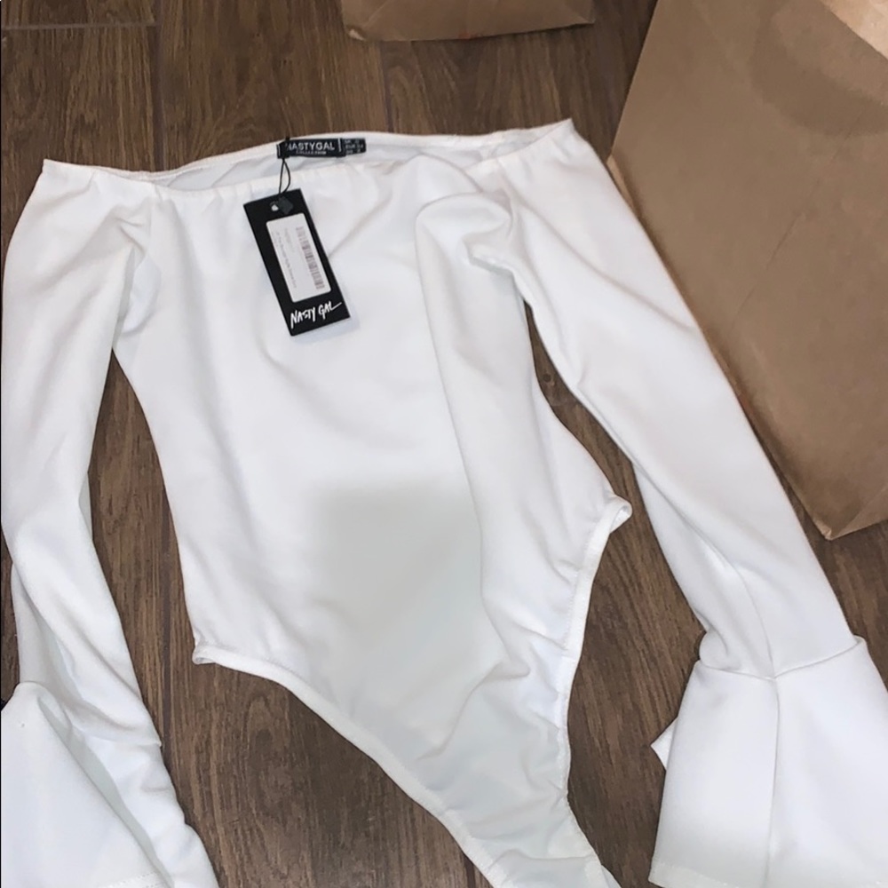 White trumpet sleeved onesie
